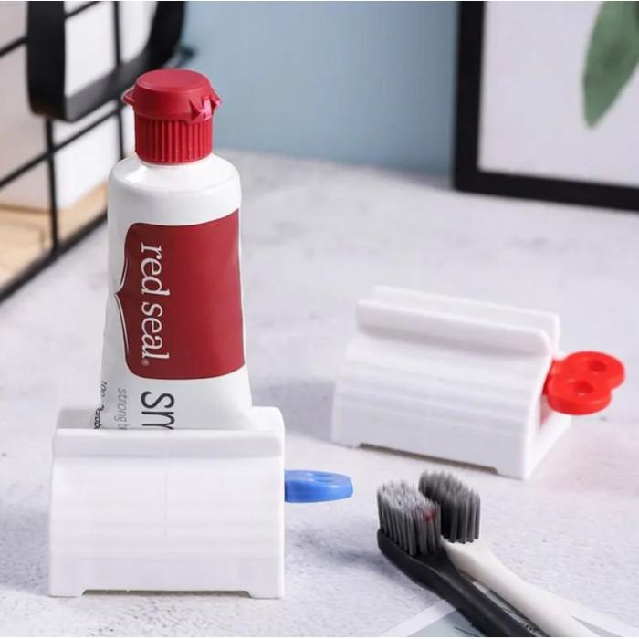 Диспенсер для зубної пасти, видавальник тюбика