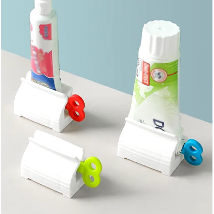 Диспенсер для зубної пасти, видавальник тюбика