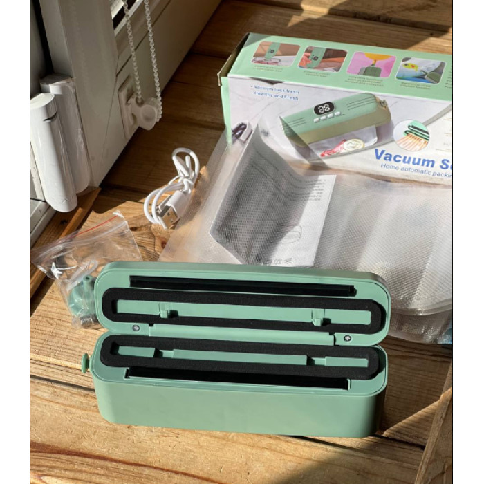 Вакуумний пакувальник vacuum machine AND 1425